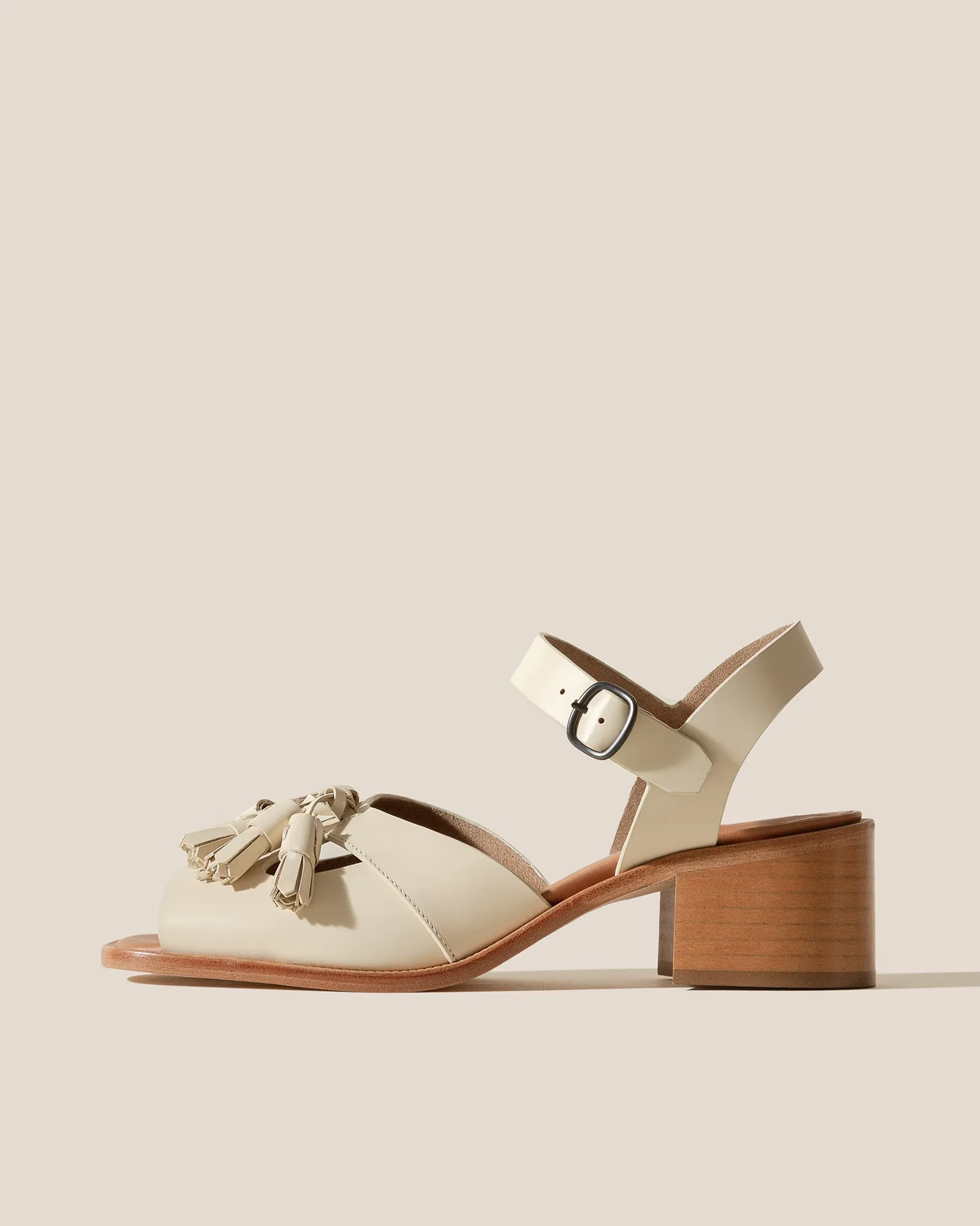 BOQUERIA HEELED - Open-Toe Tasseled Sandal sold by Hereu Studio