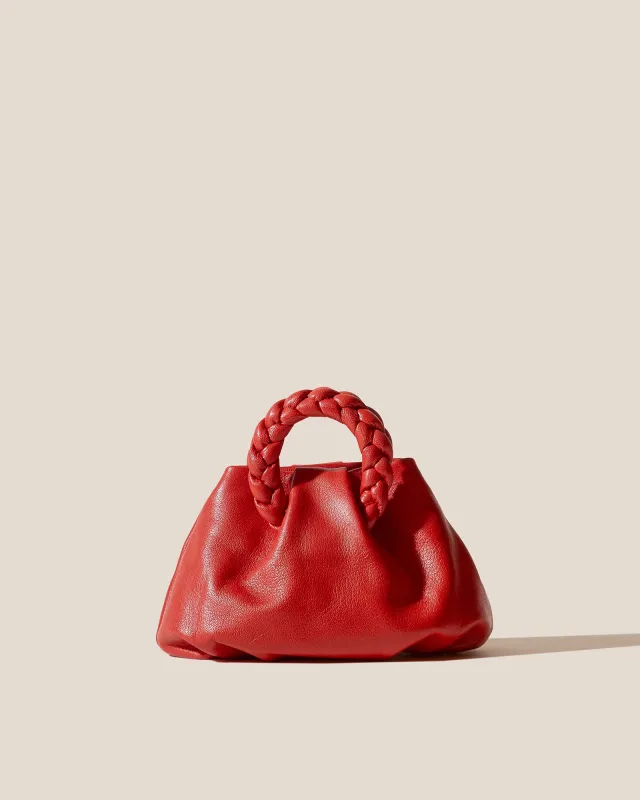 BOMBON SUPPLE SHINY - Plaited-handle Leather Handbag sold by Hereu Studio