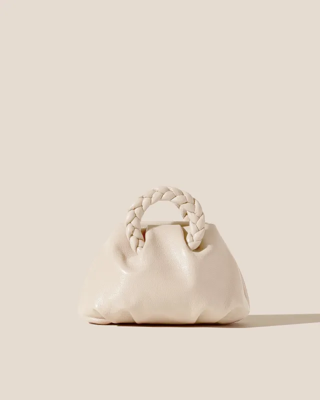 BOMBON SUPPLE SHINY - Plaited-handle Leather Handbag sold by Hereu Studio