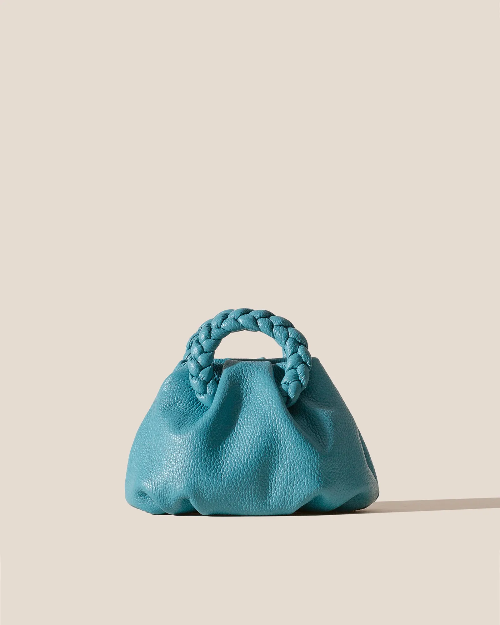 BOMBON GRAINY - Plaited-handle Leather Handbag sold by Hereu Studio