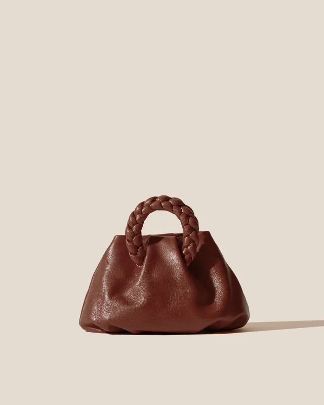 BOMBON SUPPLE SHINY - Plaited-handle Leather Handbag sold by Hereu Studio
