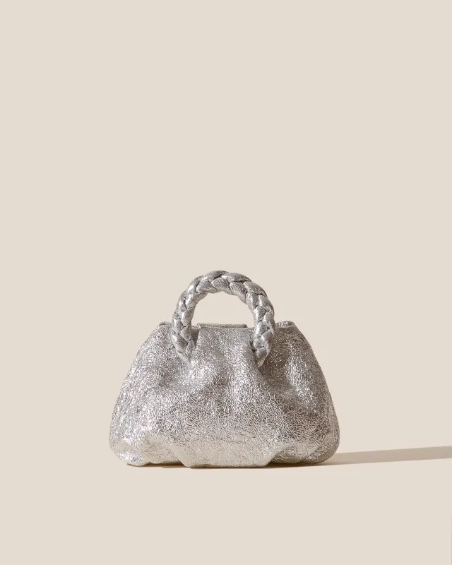 BOMBON CRINKLED METALLIC - Plaited-handle Leather Handbag sold by Hereu Studio