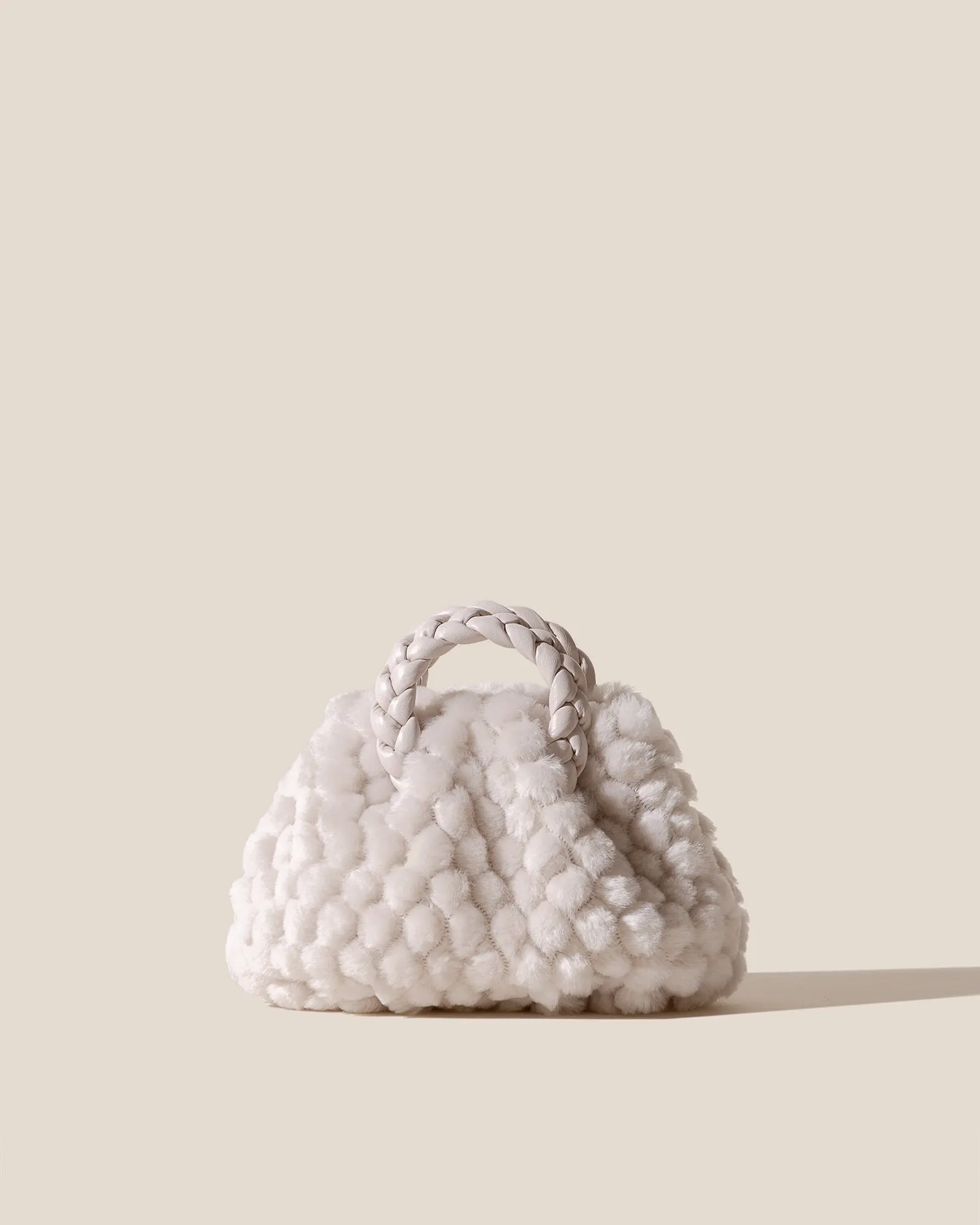 BOMBON QUILTED SHEARLING - Plaited-handle Leather Handbag sold by Hereu Studio