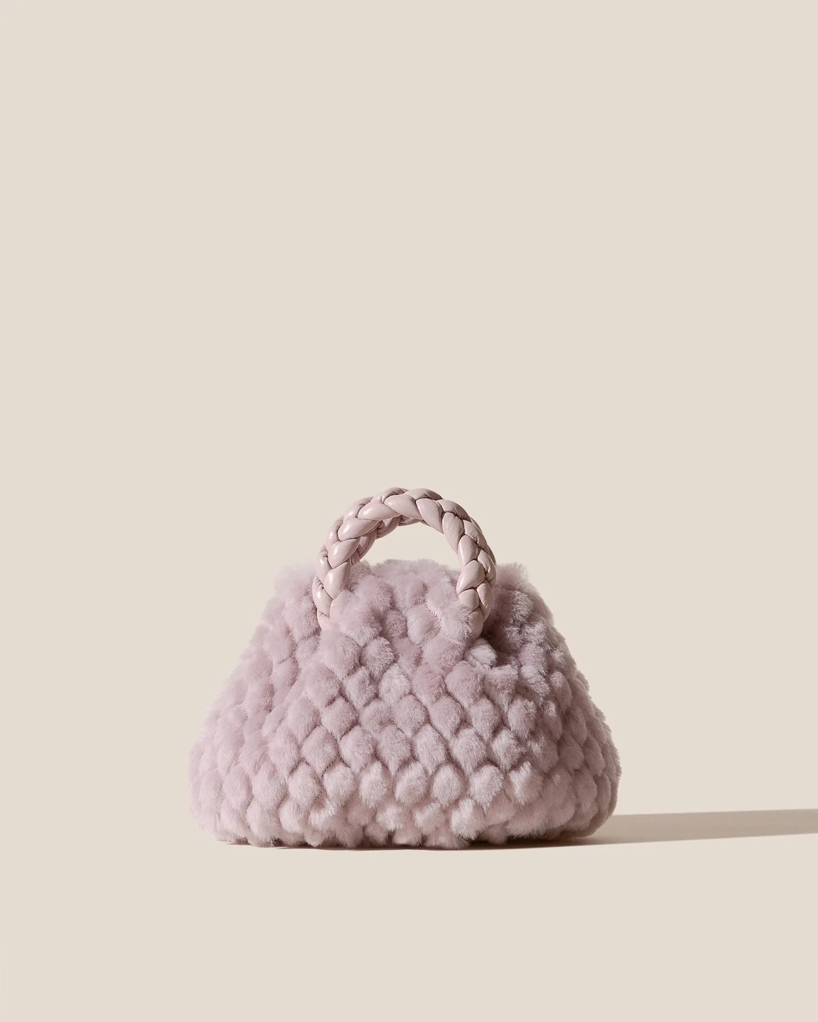 BOMBON QUILTED SHEARLING - Plaited-handle Leather Handbag sold by Hereu Studio