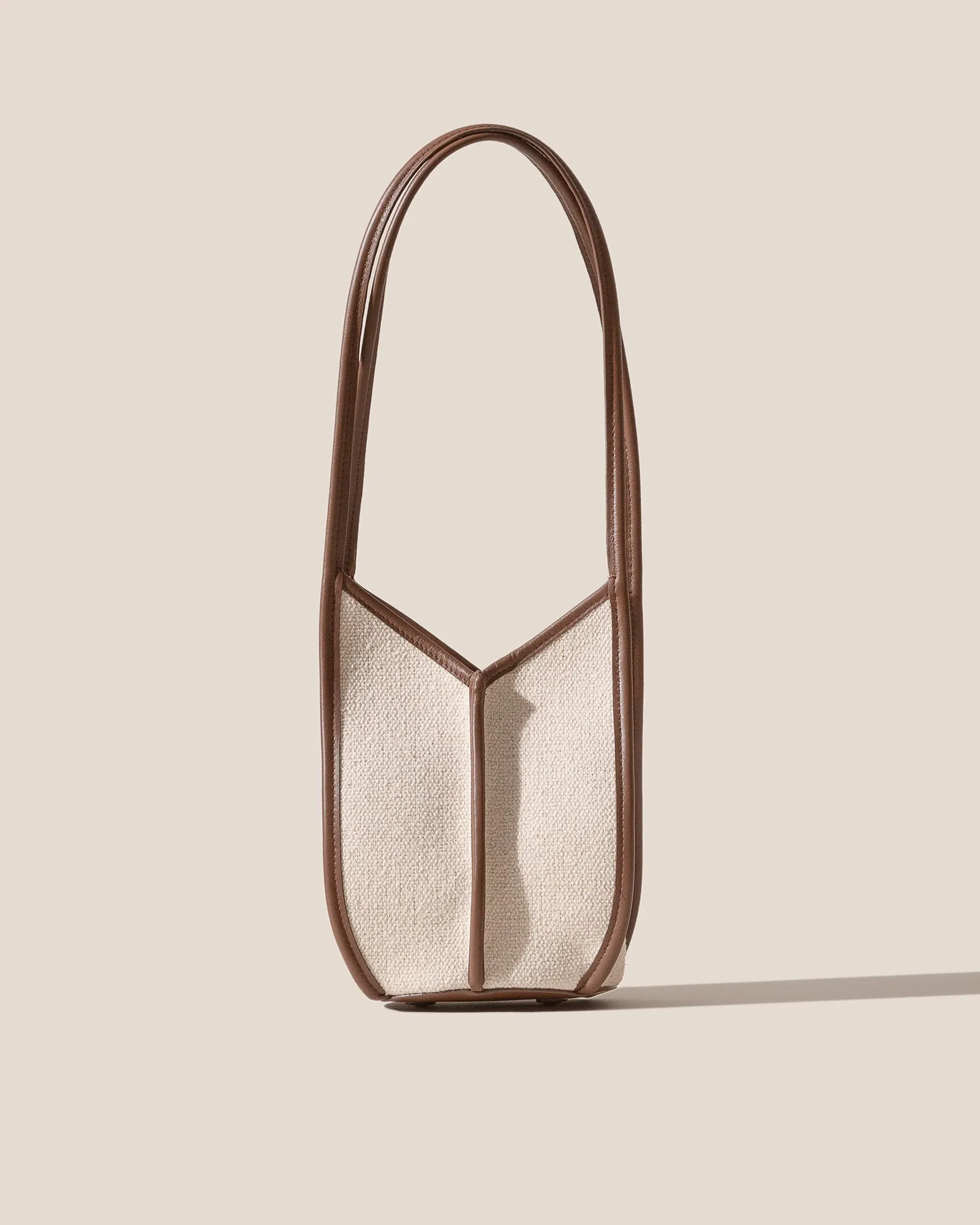 CALELLA BUCKET CANVAS - Leather-trimmed Shoulder Bag sold by Hereu Studio