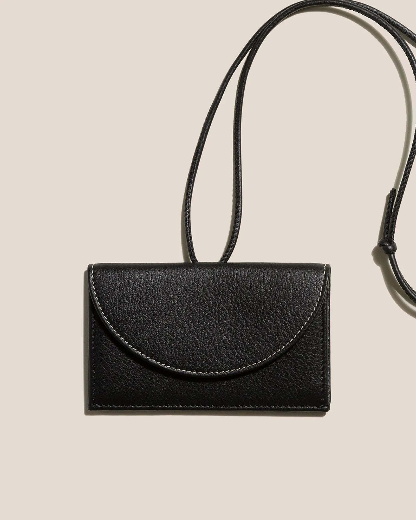 PENJAT - Leather Wallet with Strap sold by Hereu Studio