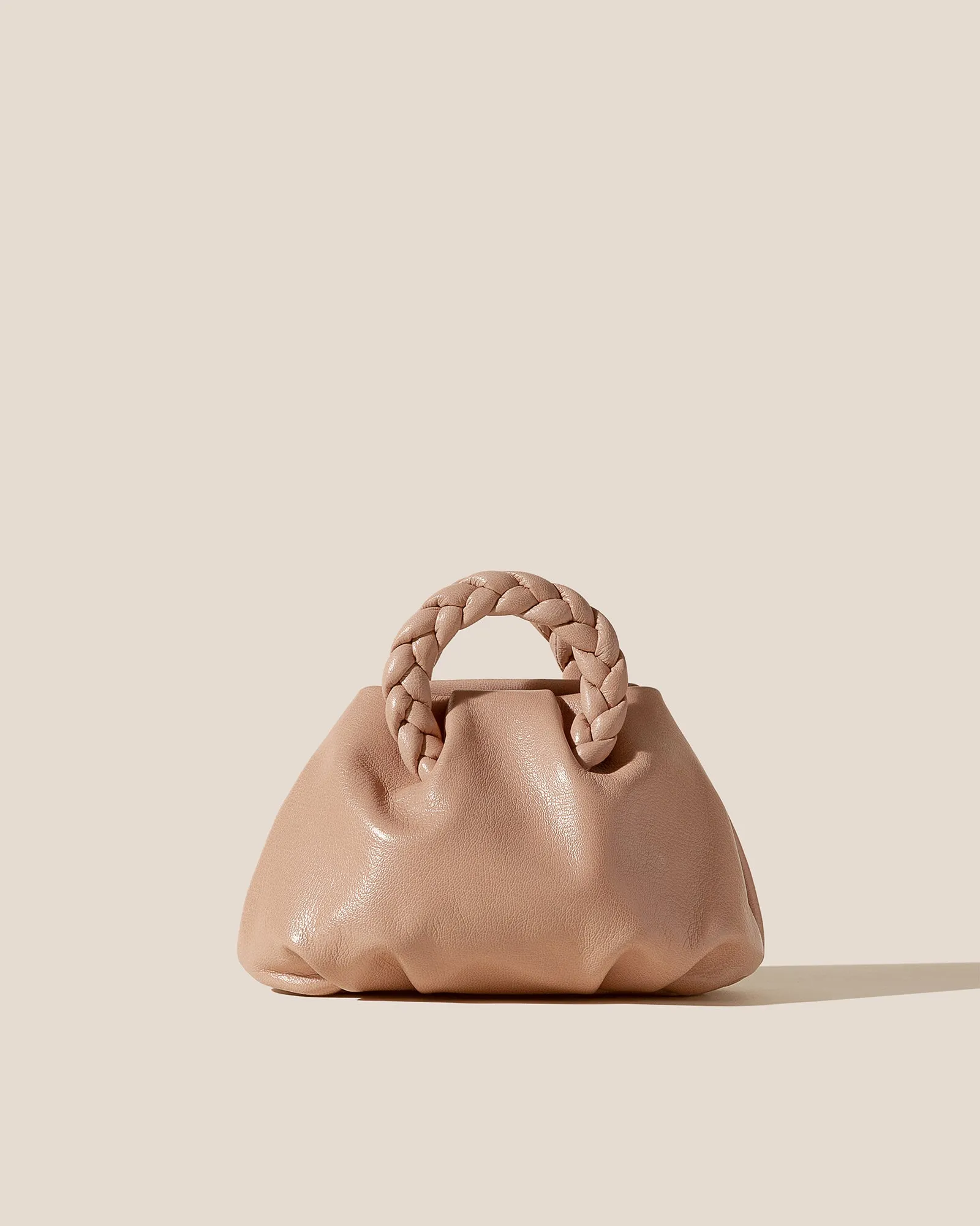 BOMBON SUPPLE SHINY - Plaited-handle Leather Crossbody Bag sold by Hereu Studio