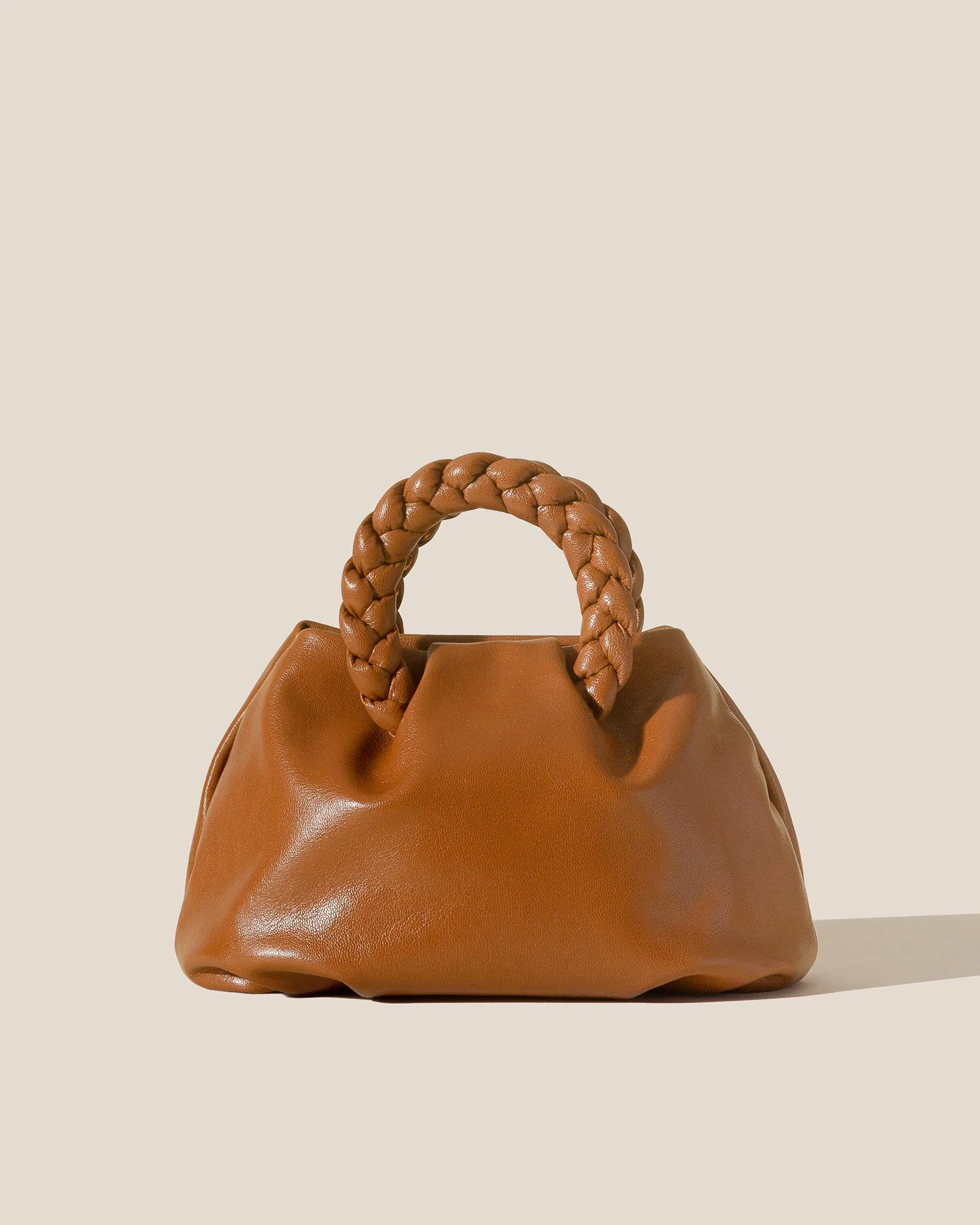 BOMBON M SUPPLE SHINY - Medium Plaited-handle Leather Handbag sold by Hereu Studio