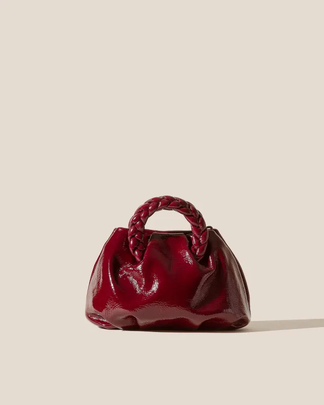 BOMBON CRINKLED GLOSSY - Small Plaited-handle Leather Crossbody Bag sold by Hereu Studio