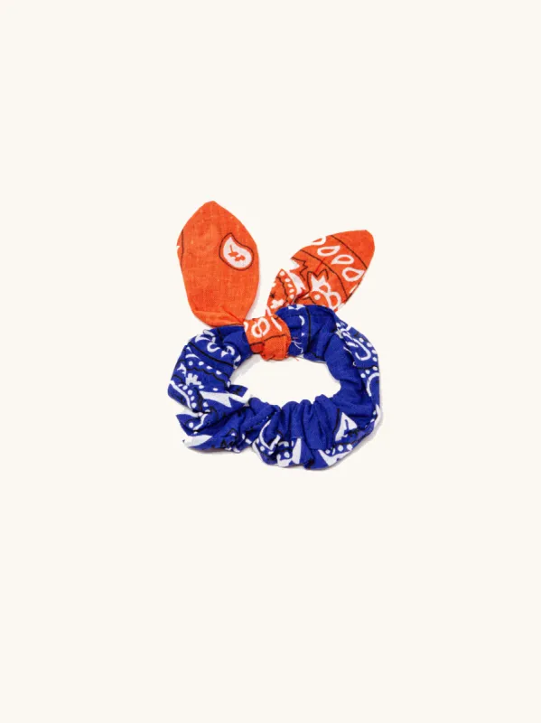 Scrunchy orange & cerulean sold by Arizona Love