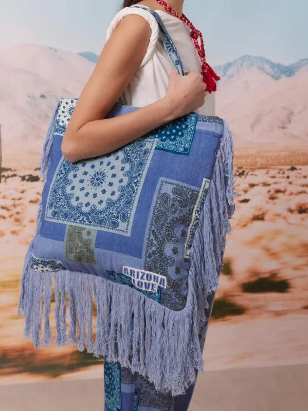 Denim quilt bag sold by Arizona Love