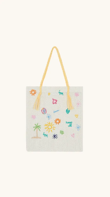 Crochet embroidered tote bag sold by Arizona Love