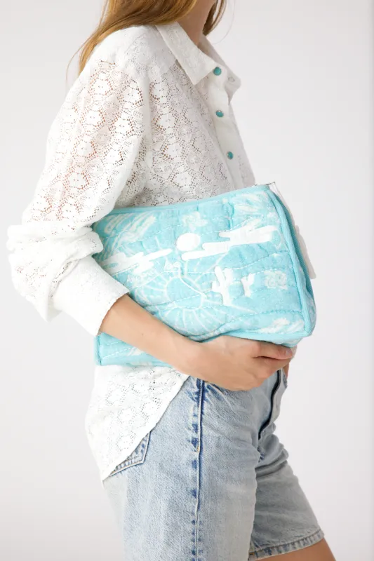 Blue sponge pouch sold by Arizona Love