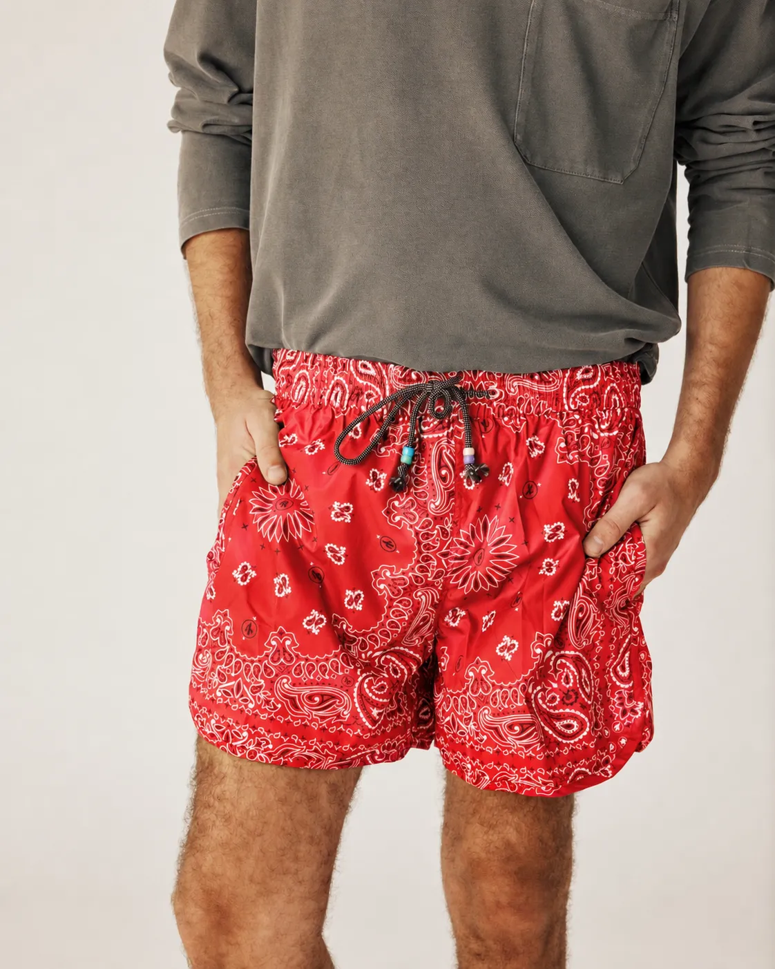 Men swimwear red sold by Arizona Love