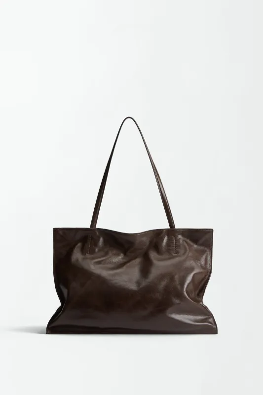 Yumi Sling Umber sold by Maeden