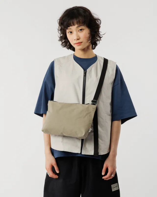 Mini Water Resistant Messenger Bag - Stone sold by Wawwa