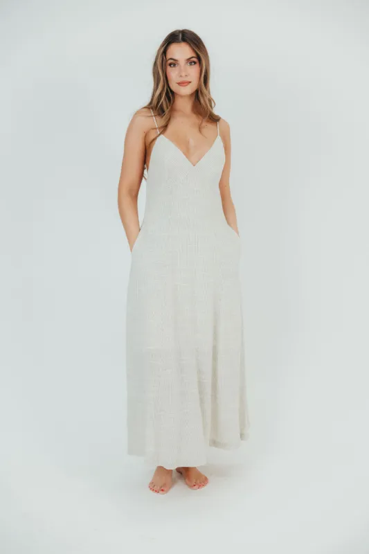 Natalia Striped Linen-Blend Maxi Dress with Open Back in Natural Stripe sold by Worth Collective