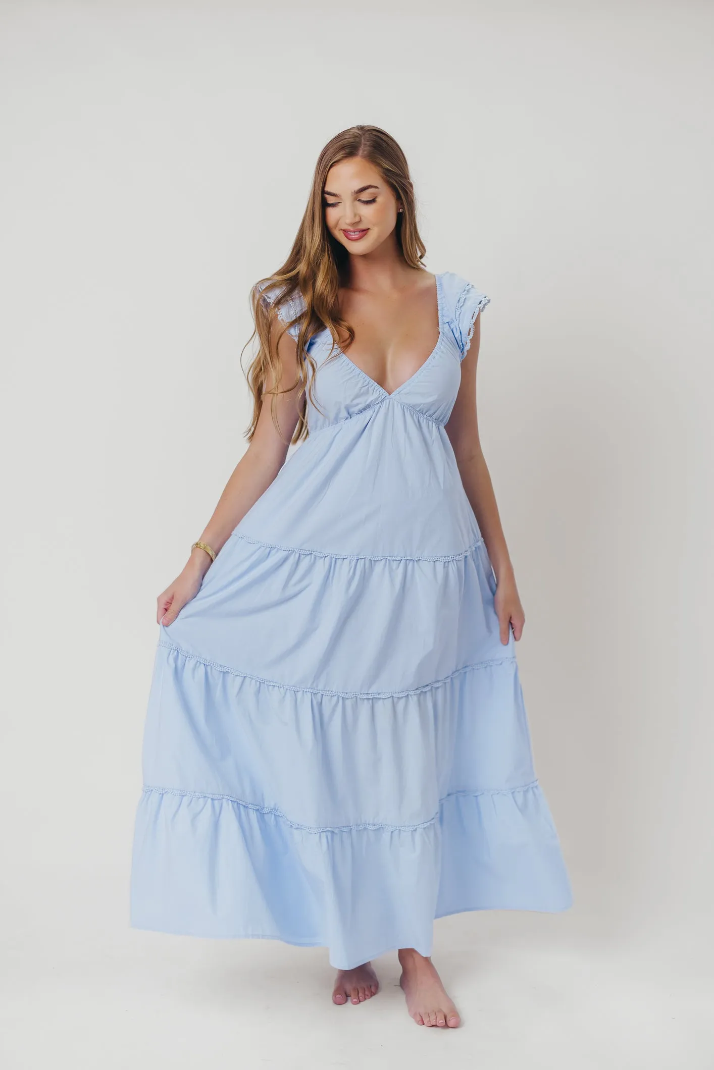 Bliss Tiered Maxi Dress with Ruffled Sleeves in Light Blue sold by Worth Collective product image thumbnail 3