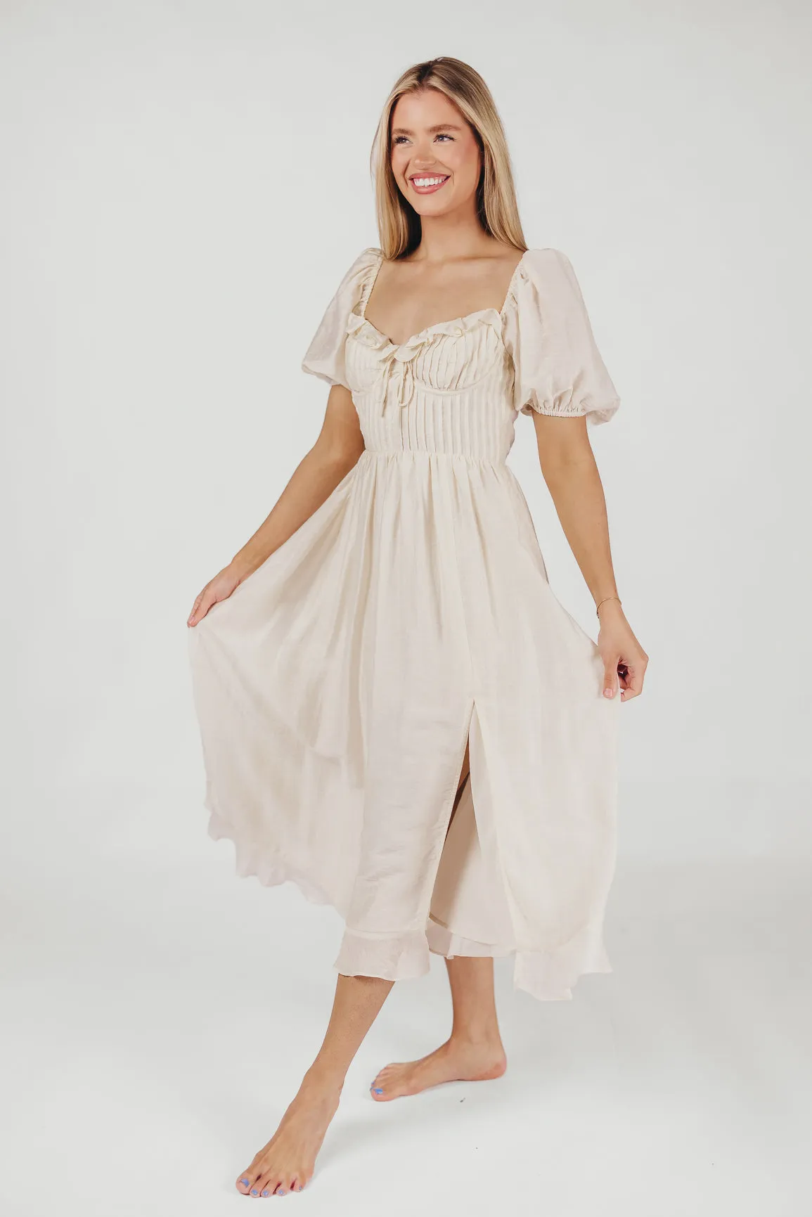 Lunaria Pleated Bustier Midi Dress in Ecru sold by Worth Collective