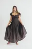 Aria Smocked Maxi Dress with Dropped Waist in Olive sold by Worth Collective
