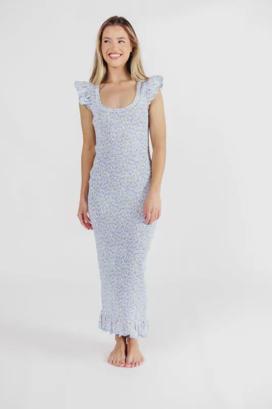 Sarah Smocked Midi Dress with Ruffled Eyelet Trim in Light Blue sold by Worth Collective