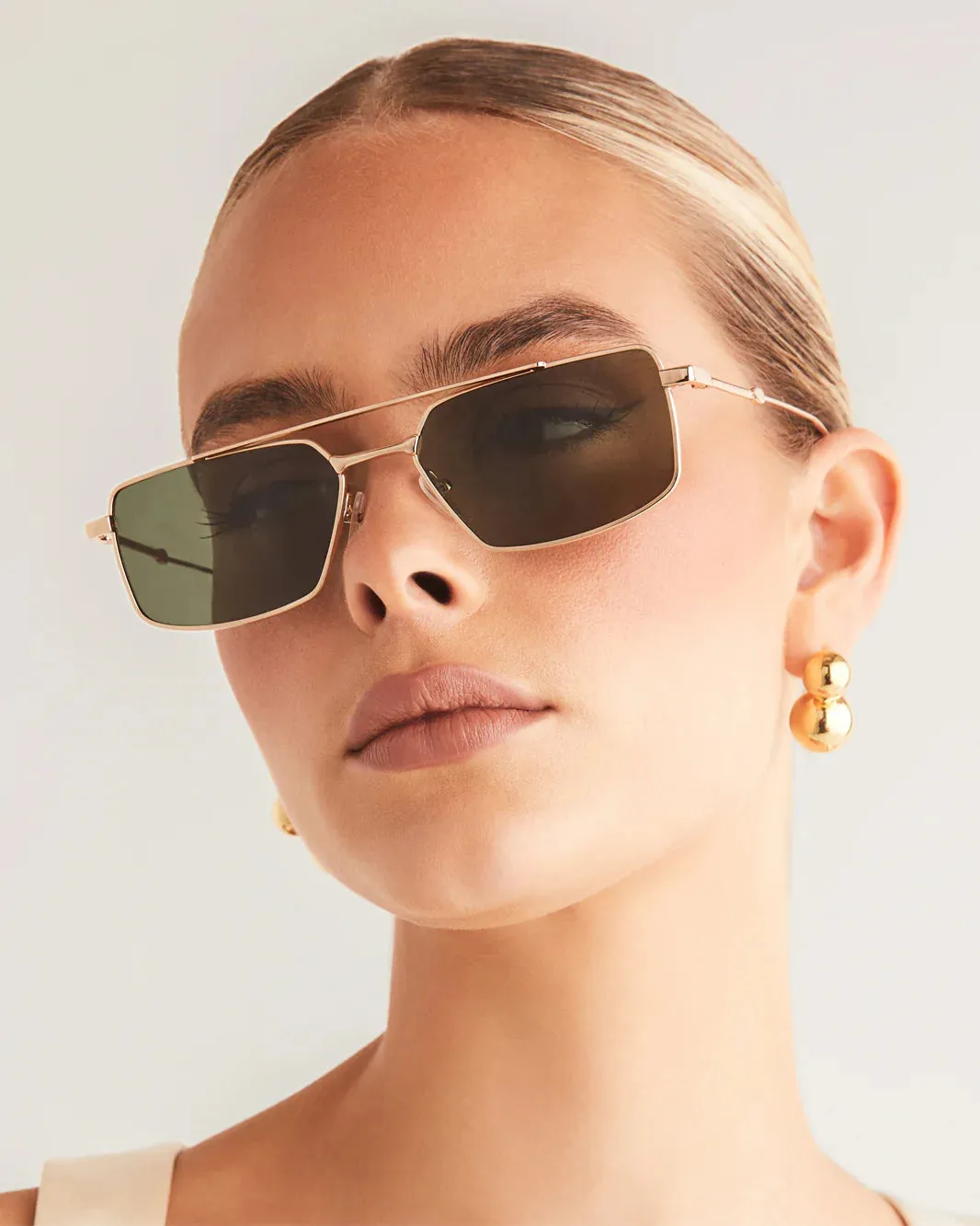 The Barbara Sunglasses from Banbé in Light Gold/Green sold by Worth Collective product image thumbnail 4