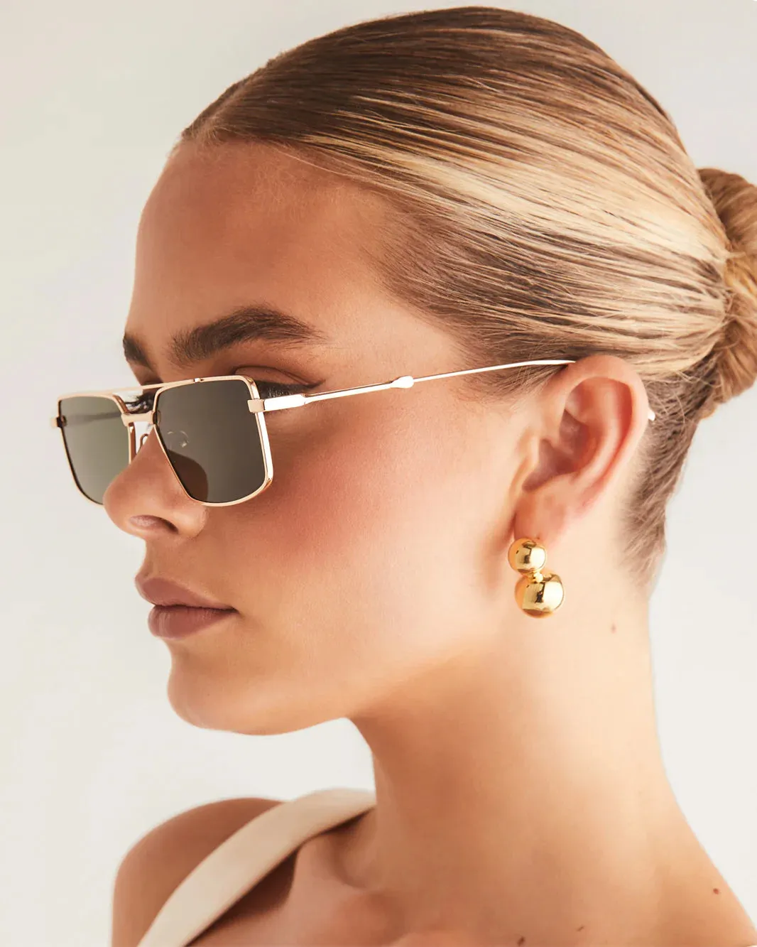 The Barbara Sunglasses from Banbé in Light Gold/Green sold by Worth Collective product image thumbnail 5