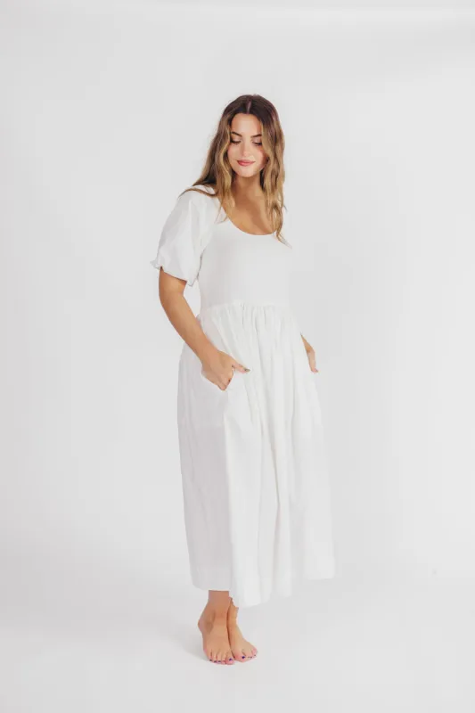 The Premium Alana Midi Dress in White sold by Worth Collective