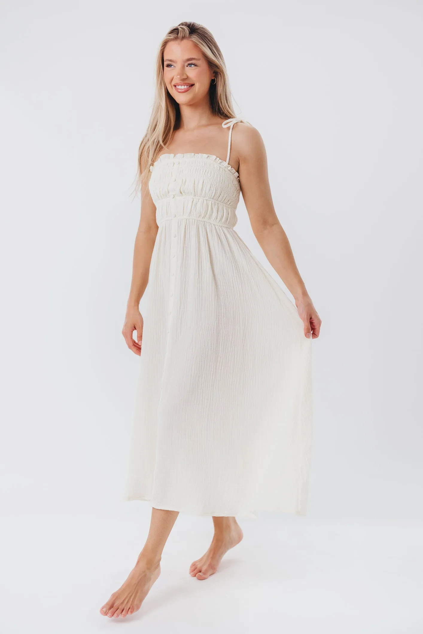 Melanie Button-Down Midi Dress in Cream sold by Worth Collective