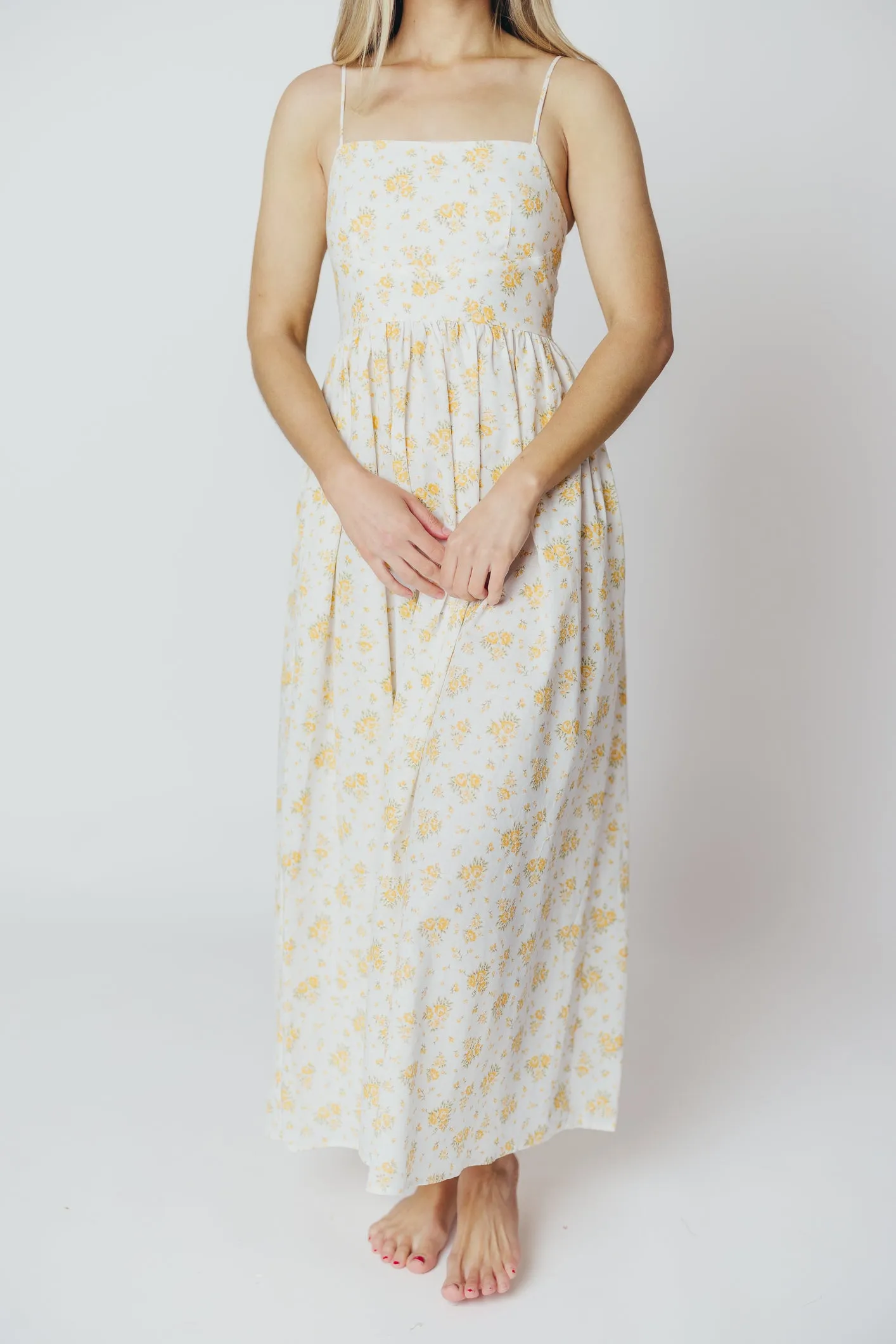 Diane Maxi Dress in White Marigold sold by Worth Collective