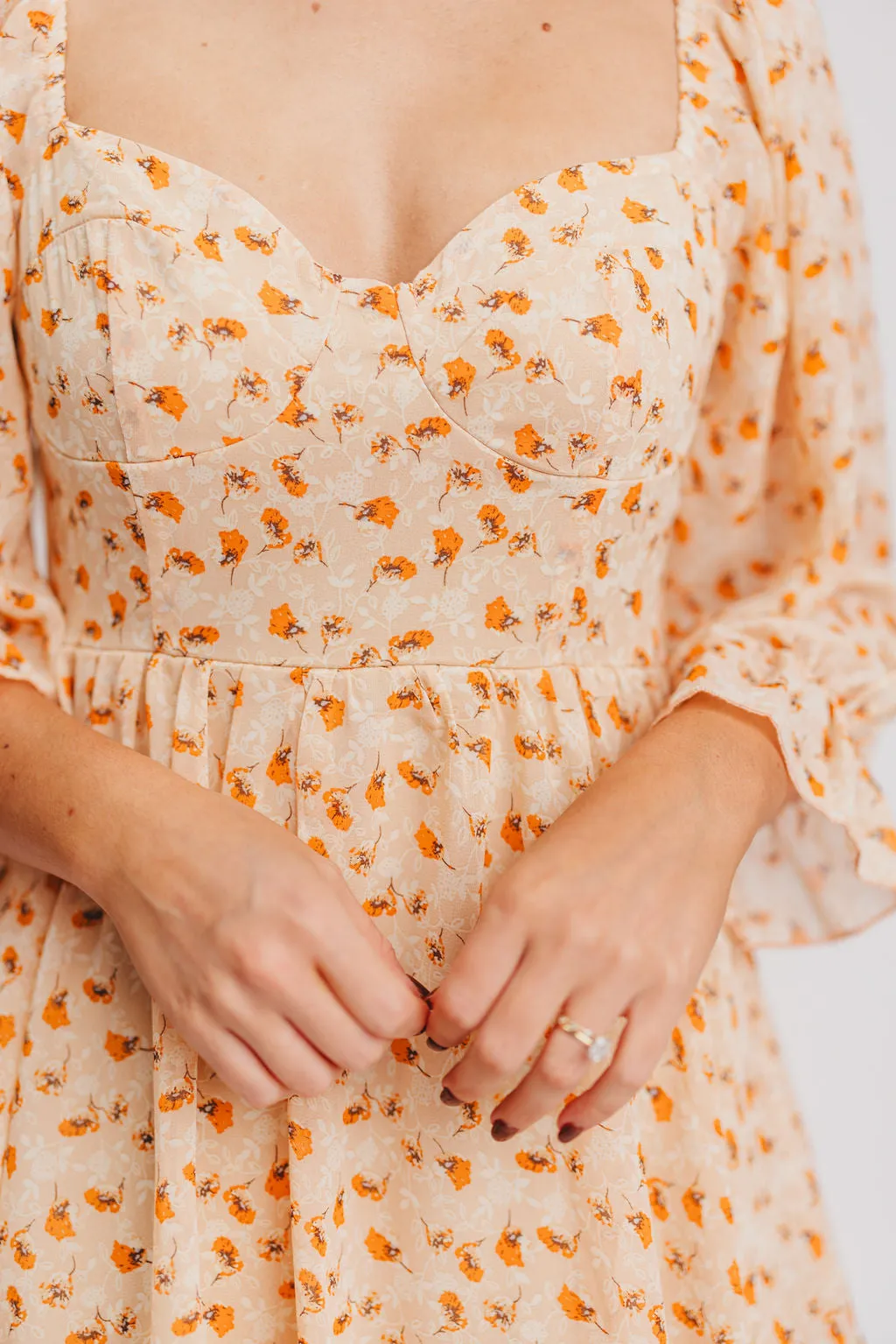 Janine Tiered Maxi Dress in Apricot Ditsy Floral sold by Worth Collective product image thumbnail 2
