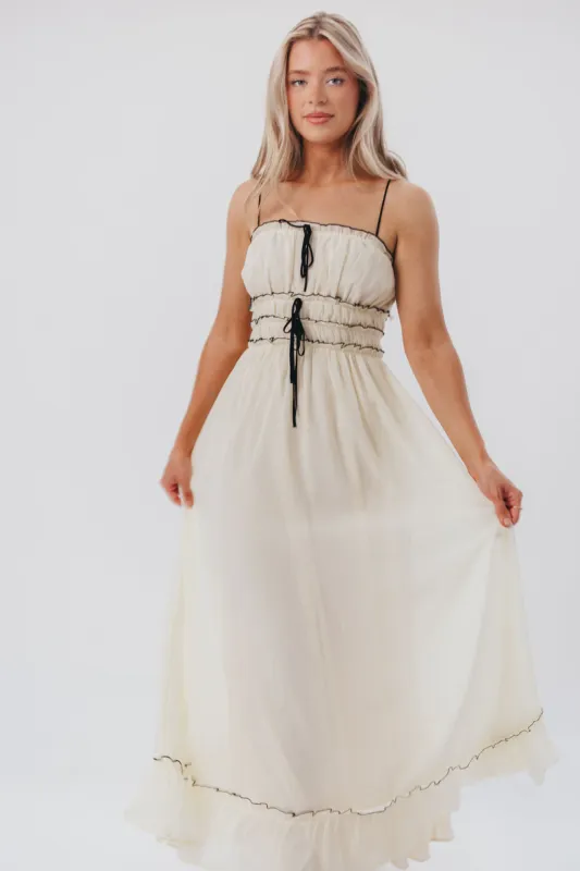 Sylvia Maxi Dress in Cream/Black sold by Worth Collective