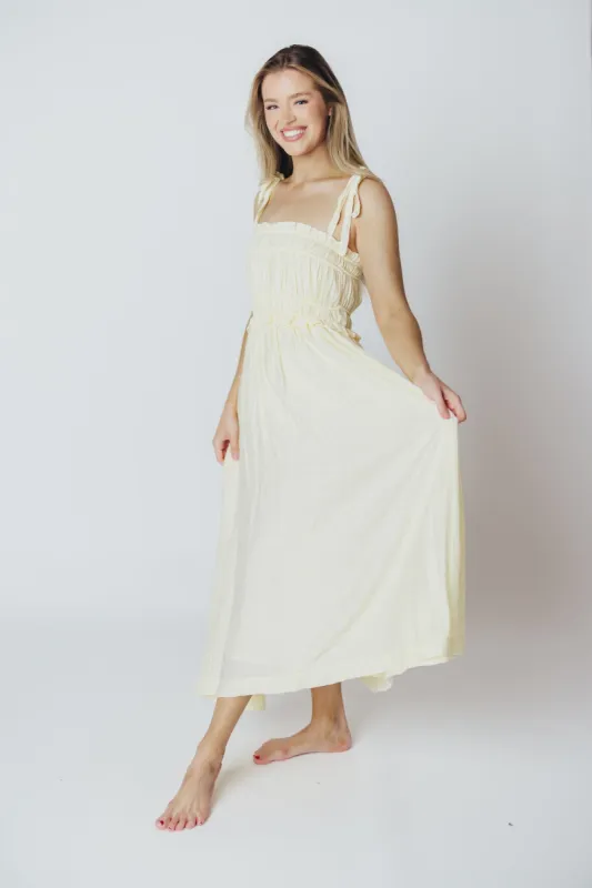 Sadie Ruffled Midi Dress in Custard sold by Worth Collective