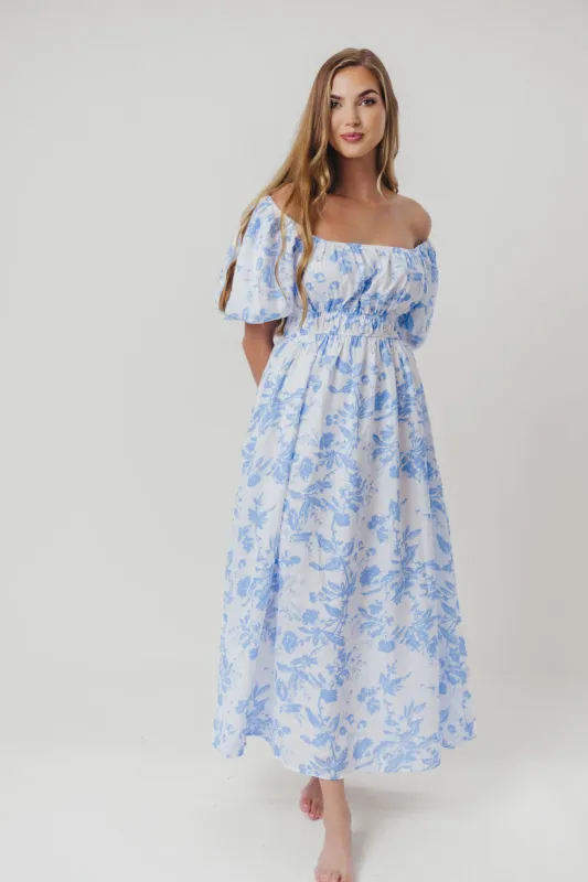 Mallory Textured Print Midi Dress in Blue Floral sold by Worth Collective