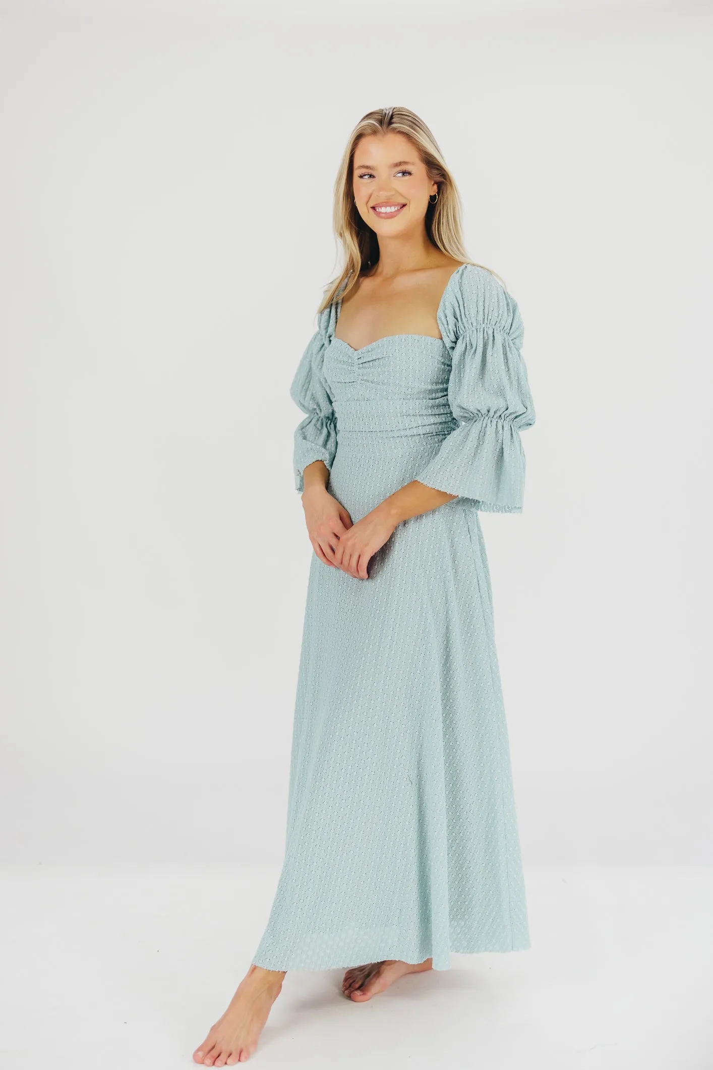 Corrine Tiered Sleeve Maxi Dress with Pockets in Teal Blue - Bump Friendly sold by Worth Collective
