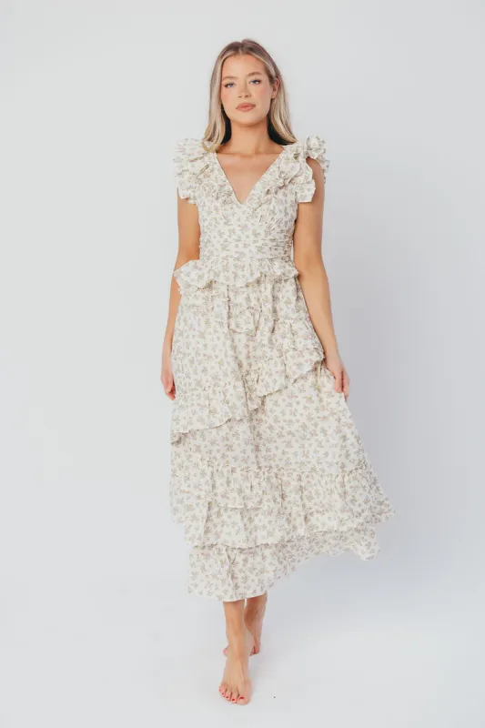 Christina Asymmetrical Ruffle Maxi Dress in Cream/Pink/Lavender sold by Worth Collective