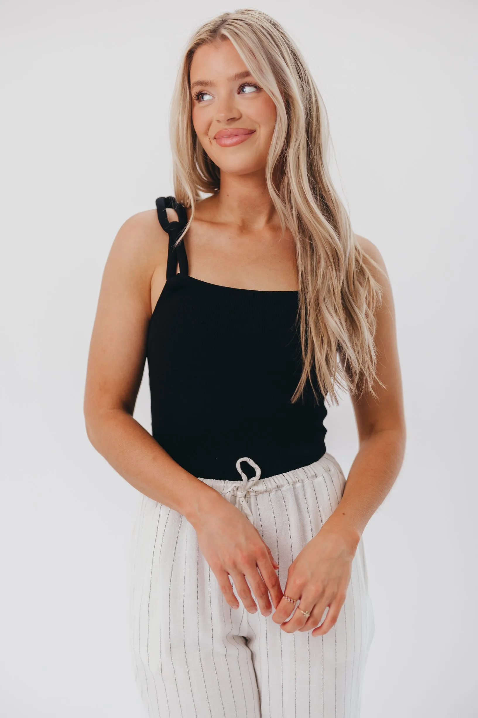 Finley Bodysuit with Chain Straps in Black sold by Worth Collective