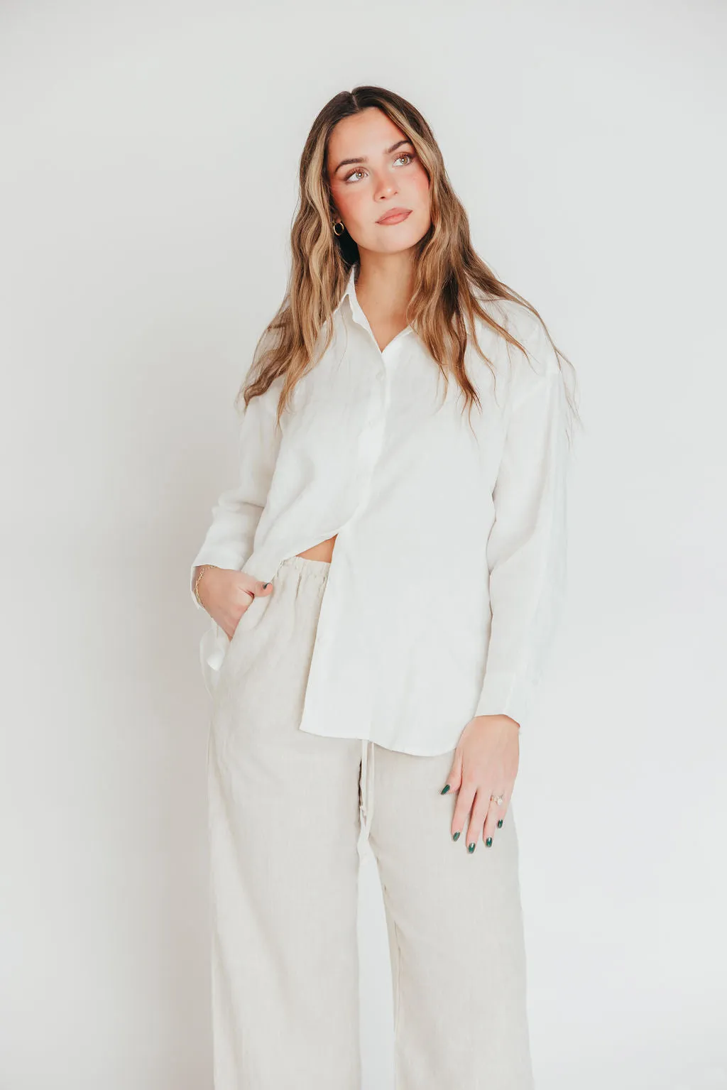 The Evelyn 100% Linen Top in White sold by Worth Collective