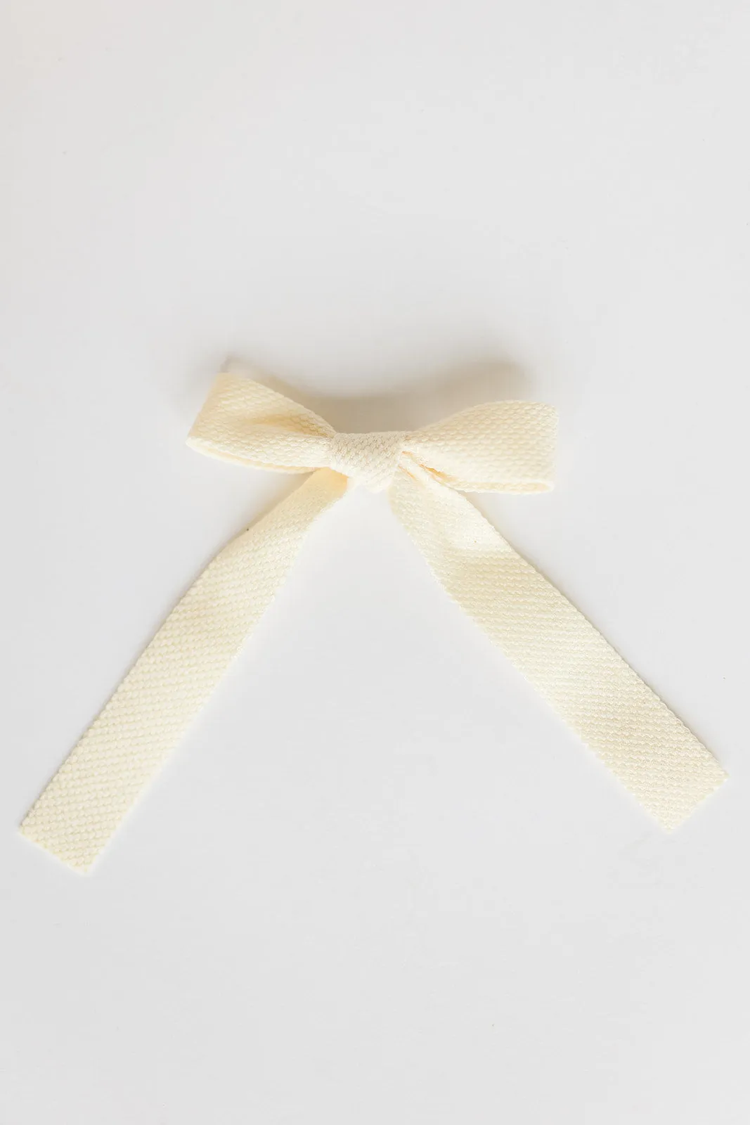 Leah Woven Bow Clip in Cream sold by Worth Collective product image thumbnail 2