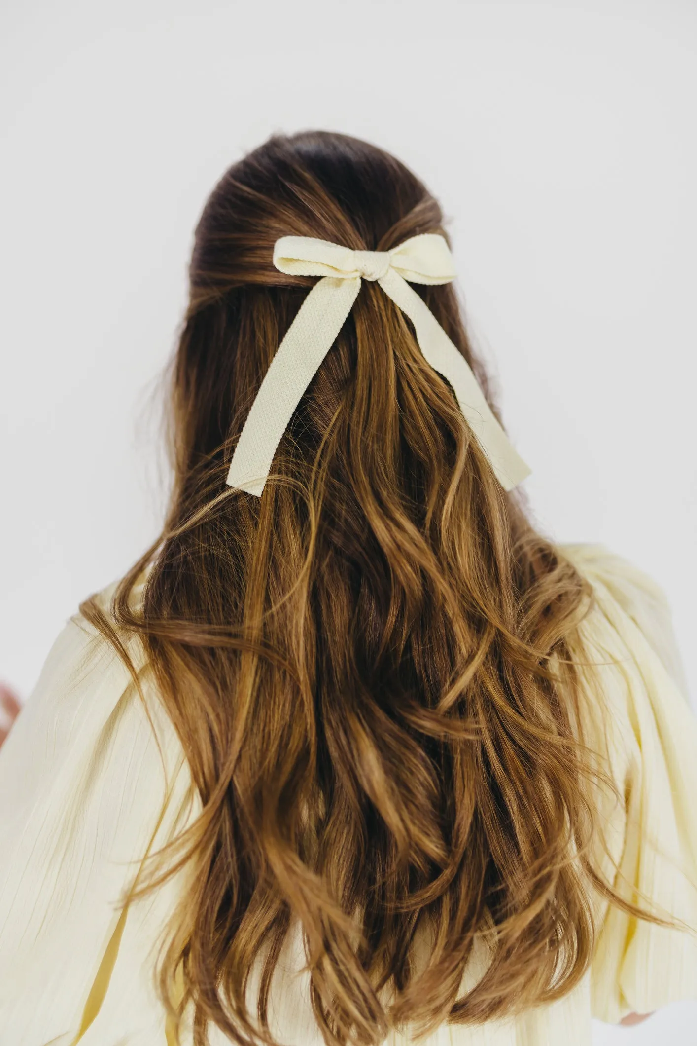 Leah Woven Bow Clip in Cream sold by Worth Collective product image thumbnail 3
