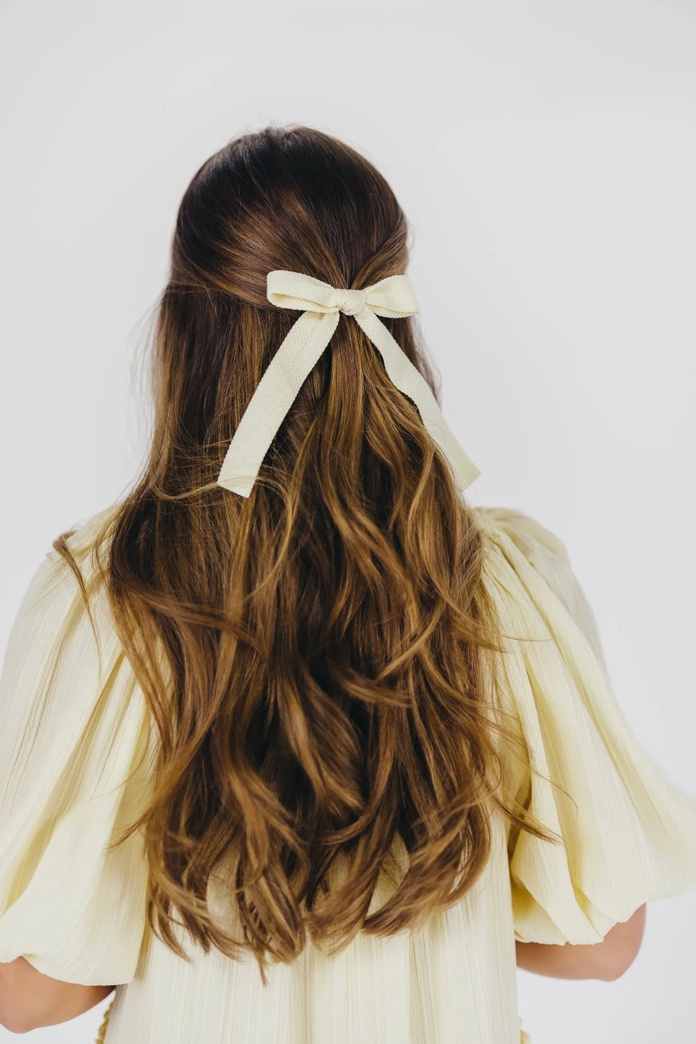 Leah Woven Bow Clip in Cream sold by Worth Collective product image thumbnail 4