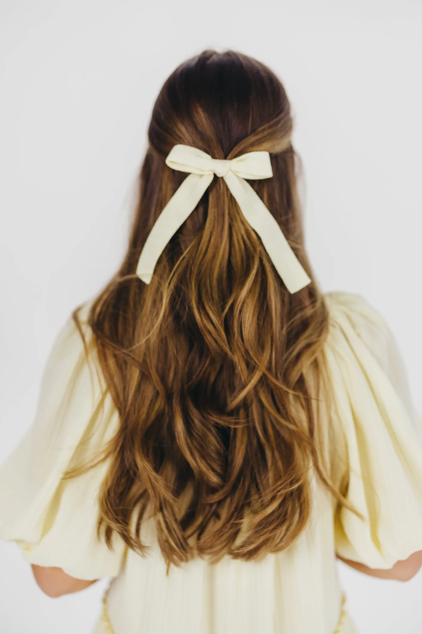 Leah Woven Bow Clip in Cream sold by Worth Collective