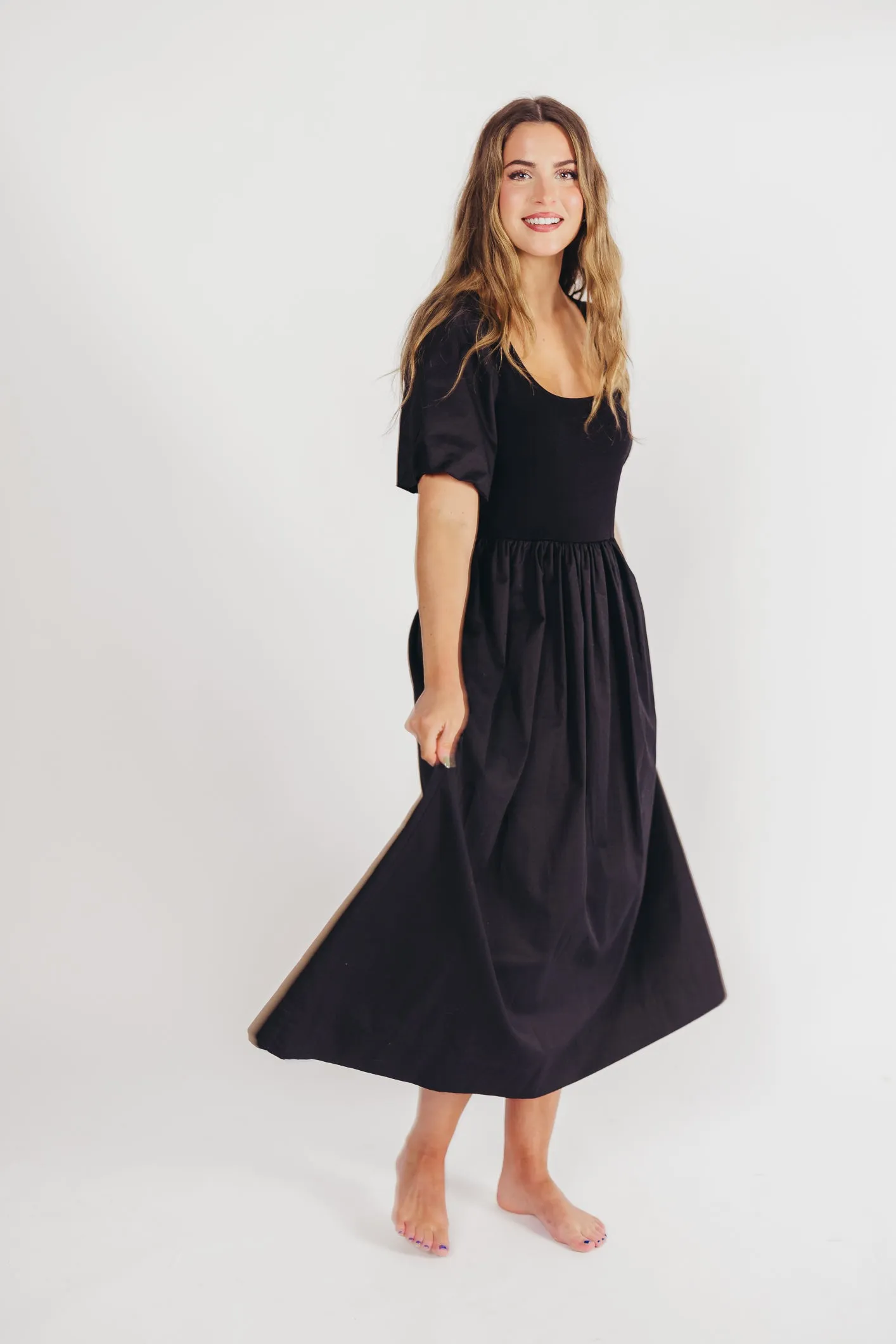 The Premium Alana Midi Dress in Black sold by Worth Collective product image thumbnail 2