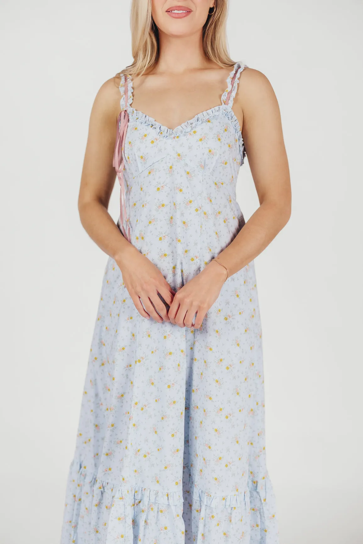 Penelope Cotton Maxi Dress with Ruffle Accents in Powder Blue Floral sold by Worth Collective product image thumbnail 3