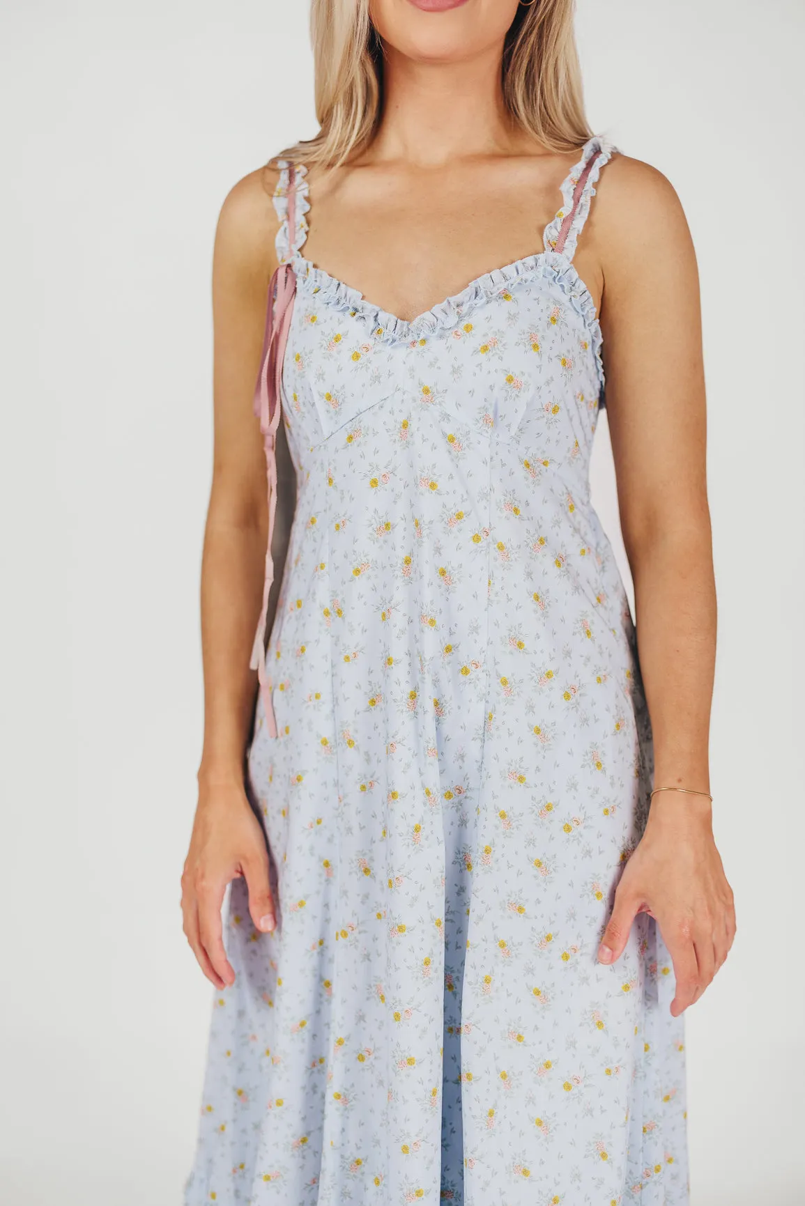 Penelope Cotton Maxi Dress with Ruffle Accents in Powder Blue Floral sold by Worth Collective product image thumbnail 4