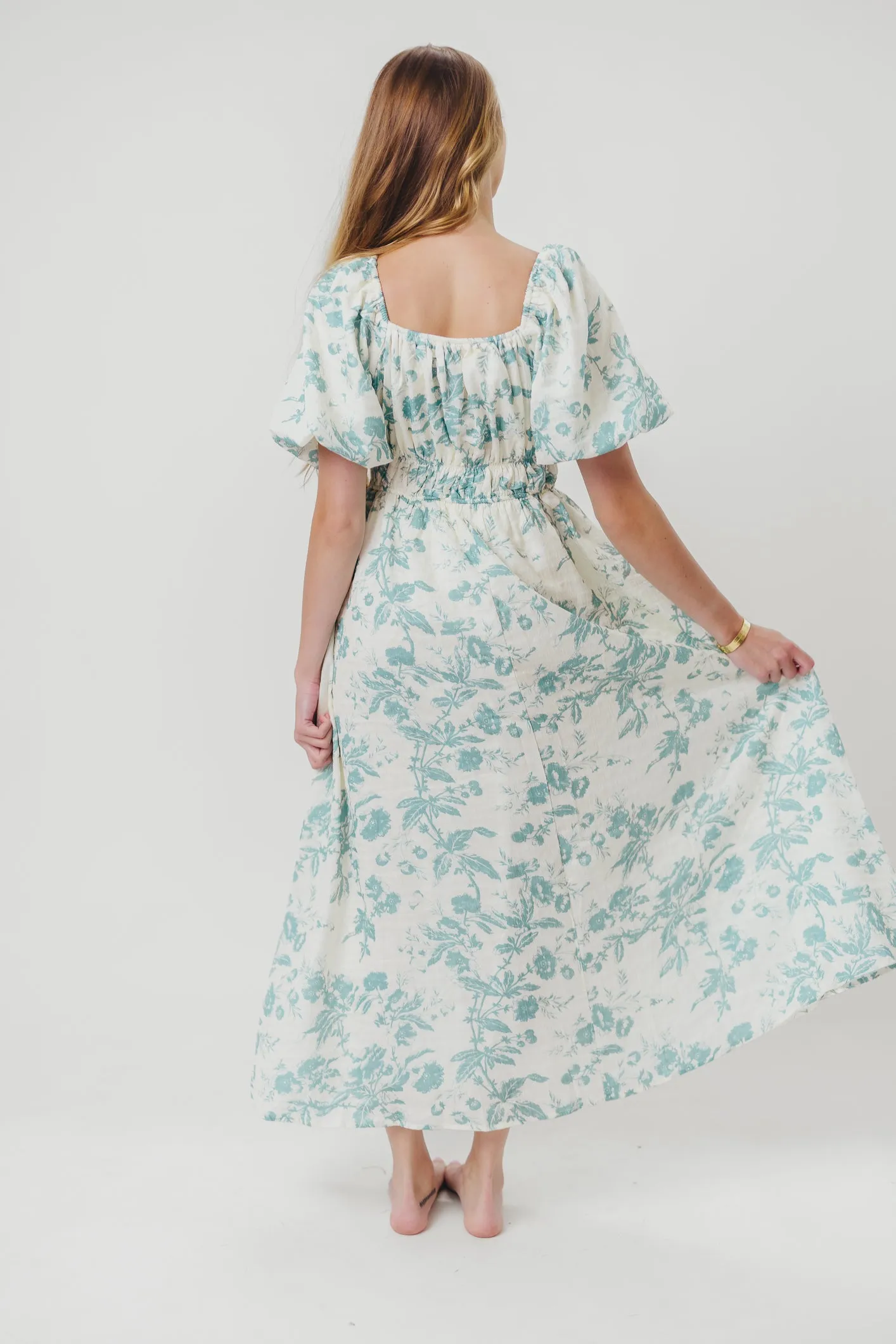 Mallory Textured Print Midi Dress in Teal Floral sold by Worth Collective product image thumbnail 5