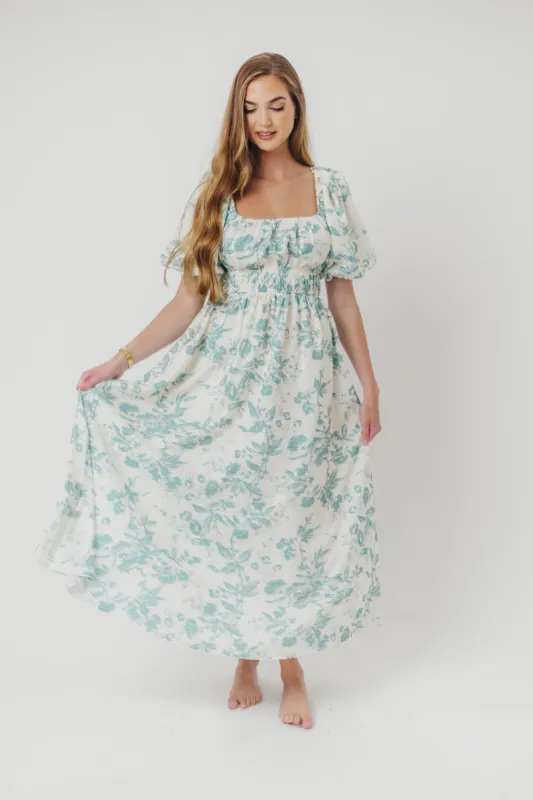 Mallory Textured Print Midi Dress in Teal Floral sold by Worth Collective