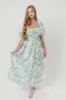Mallory Textured Print Midi Dress in Teal Floral sold by Worth Collective