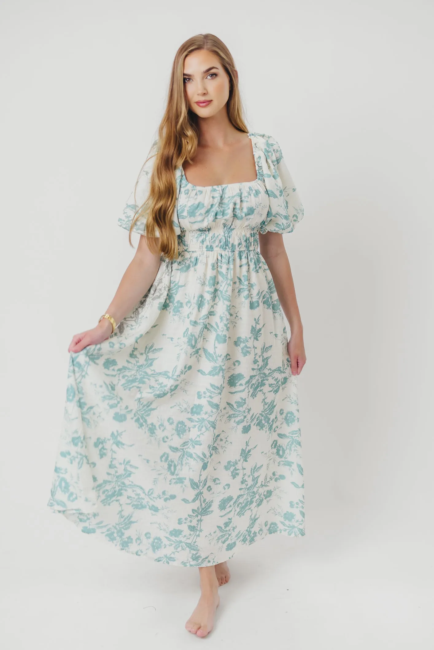 Mallory Textured Print Midi Dress in Teal Floral sold by Worth Collective product image thumbnail 3