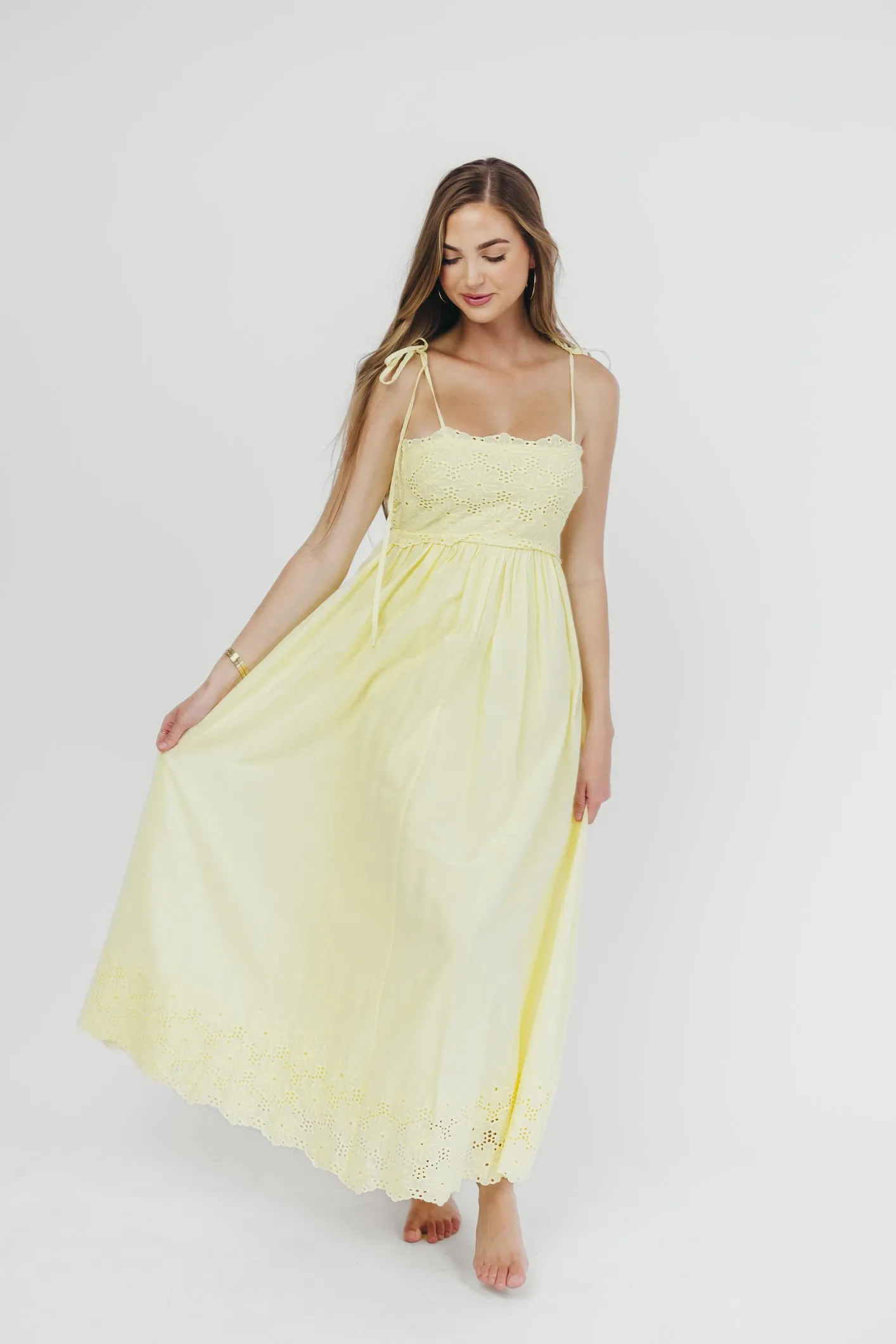 Sunny Days Scalloped Eyelet Lace Midi Dress in Yellow sold by Worth Collective